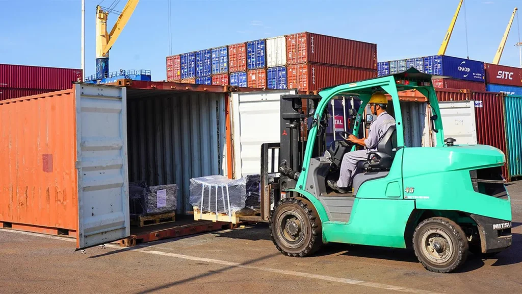 Workers packing products for international export from the UAE